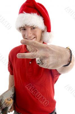 smiling male showing victory sign