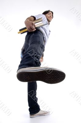 student showing shoe sole