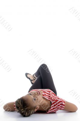 laying woman looking at camera