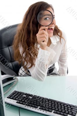 woman looking through lens
