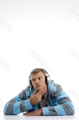 handsome man listening to music and thinking