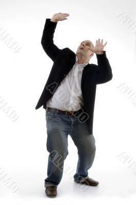 young businessman pushing up