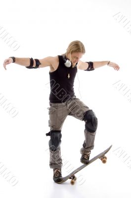 adventuring man balancing skateboard