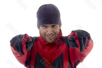 smiling handsome man pointing towards