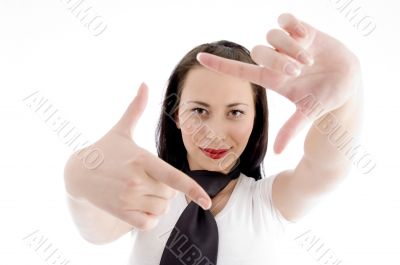 young woman creates a frame with her hands