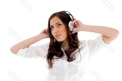 young female enjoying music