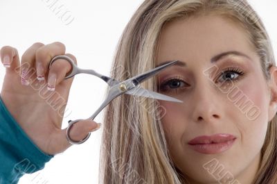 woman showing scissor
