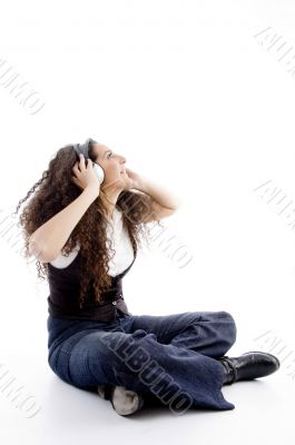 latin american female enjoying music