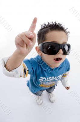 pointing cute little boy with sunglasses