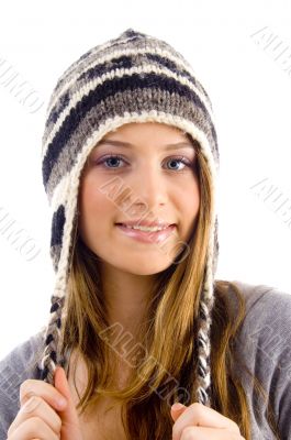 portrait of attractive female wearing woolen cap