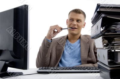 young man sitting in office