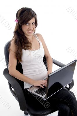 smiling woman working on laptop