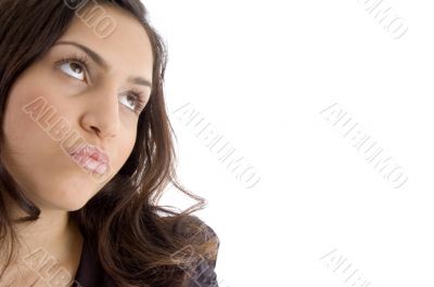 portrait of thinking young woman looking aside