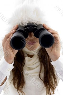 beautiful woman looking through binocular