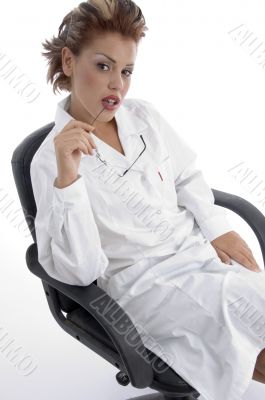 sitting pretty doctor with eyeglasses