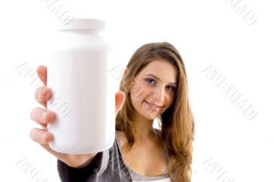 beautiful female showing white bottle