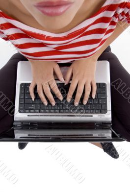 sitting female working on laptop