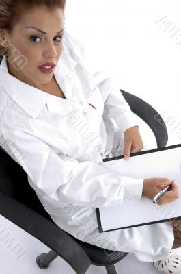 sitting doctor with writing board