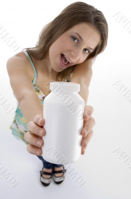 woman posing with plastic bottle