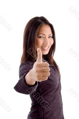 young woman showing thumb up