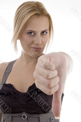 woman showing thumbs down gesture