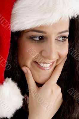 smiling young woman with christmas hat