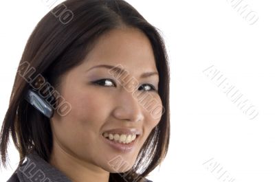 close up of female using bluetooth device