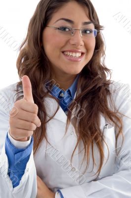 smiling doctor showing thumbs up