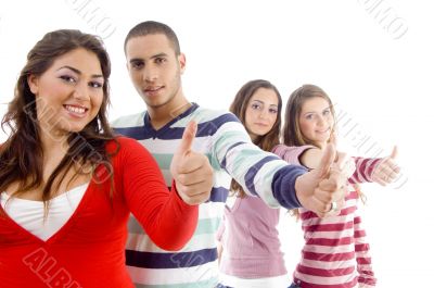 happy young friends with thumbs up
