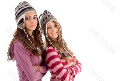 two young friends wearing woolen cap