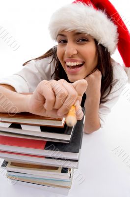 cheerful student wearing christmas hat