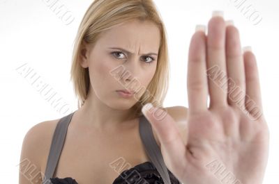 angry woman showing stopping gesture
