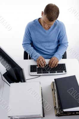 high angle view of working man on computer
