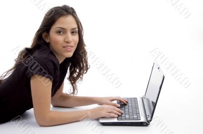 laying woman with laptop
