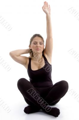 young female doing yoga