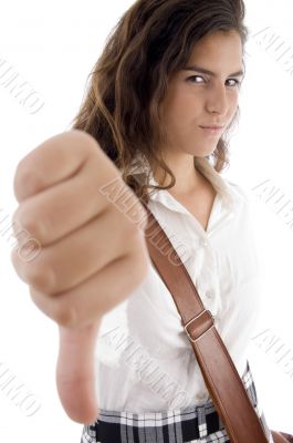 college student showing thumb down