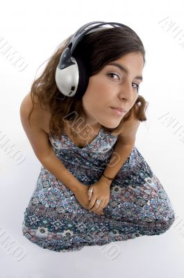 high angle view of young female with headphone