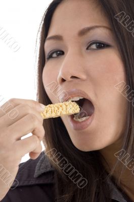 pretty woman eating cookies