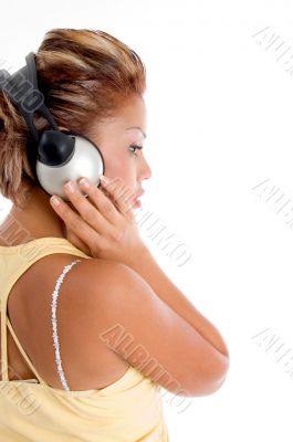 side pose of woman with headphone