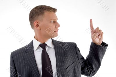 portrait of young professional looking his finger