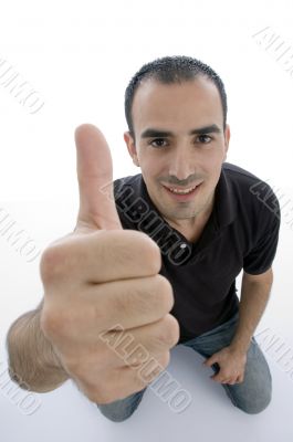 male with thumbs up hand gesture