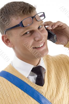smiling young student on phone