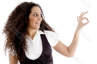 cute woman showing okay hand gesture
