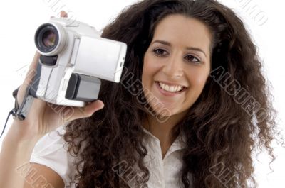 young photographer making video with handy cam