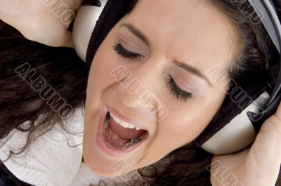 female shouting while listening music