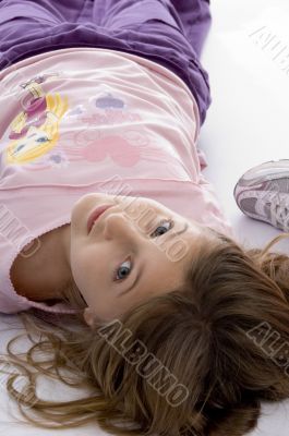 little blonde girl looking at camera