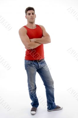 male posing in front of camera with crossed arms