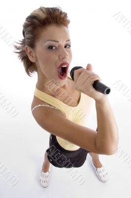 sexy woman singing in microphone