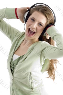 woman listening to headset enjoying