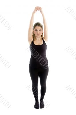 young girl stretching her arms